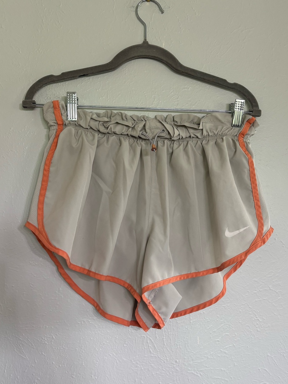 Nike Dri-Fit Women's Beige Athletic Shorts with Orange Trim
